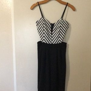 Romper, skinny pants.